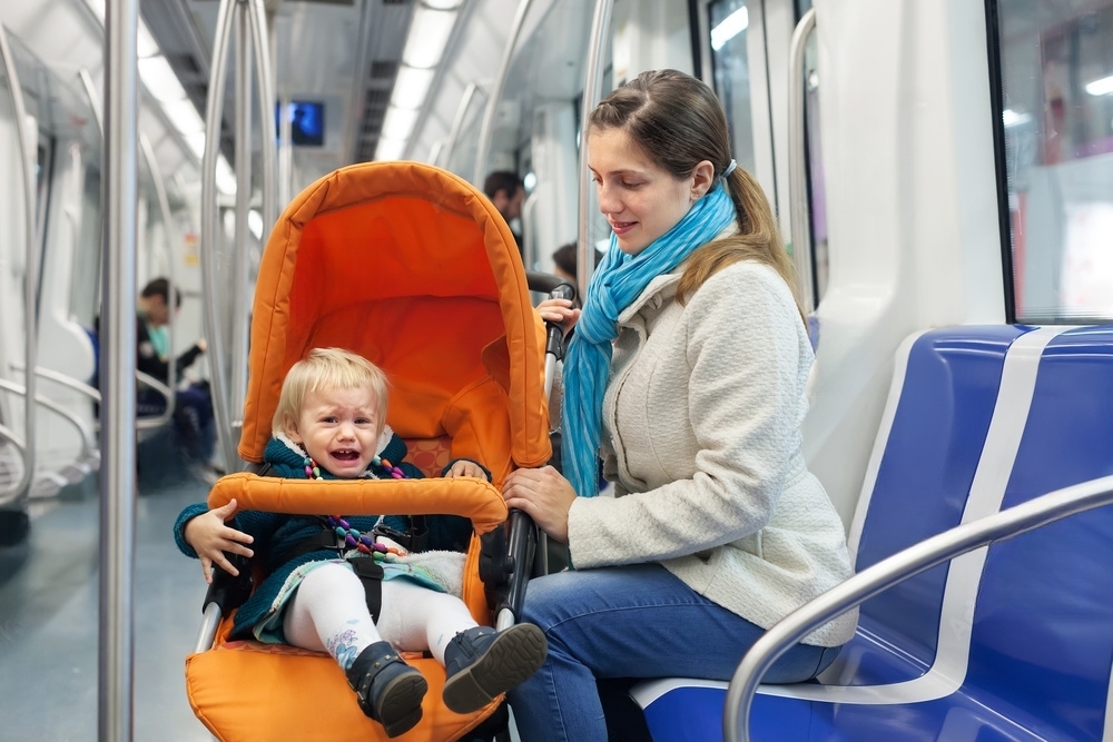 soothe a crying baby in a public